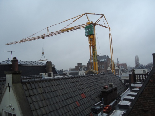 22 december 2011, de Gemeente in actie bij de Lange Leidsedwarsstraat 35...